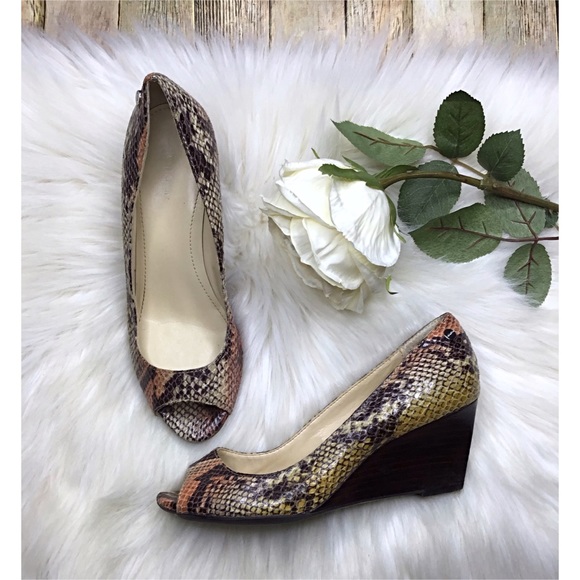 Calvin Klein Shoes - Calvin Klein Peep Toe Snake Skin Wedge Pumps